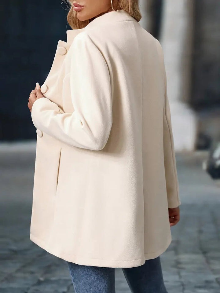 Wilhelmina cream stand-collar longline blazer coat, back view
