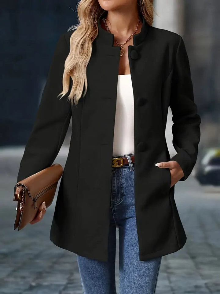 Wilhelmina black stand-collar longline blazer coat, close-up front detail