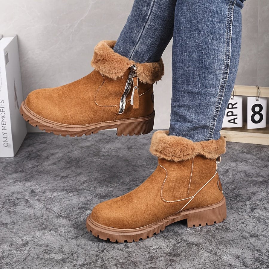 Wren fur lined ankle boots in tan suede with folded fur cuff, side view