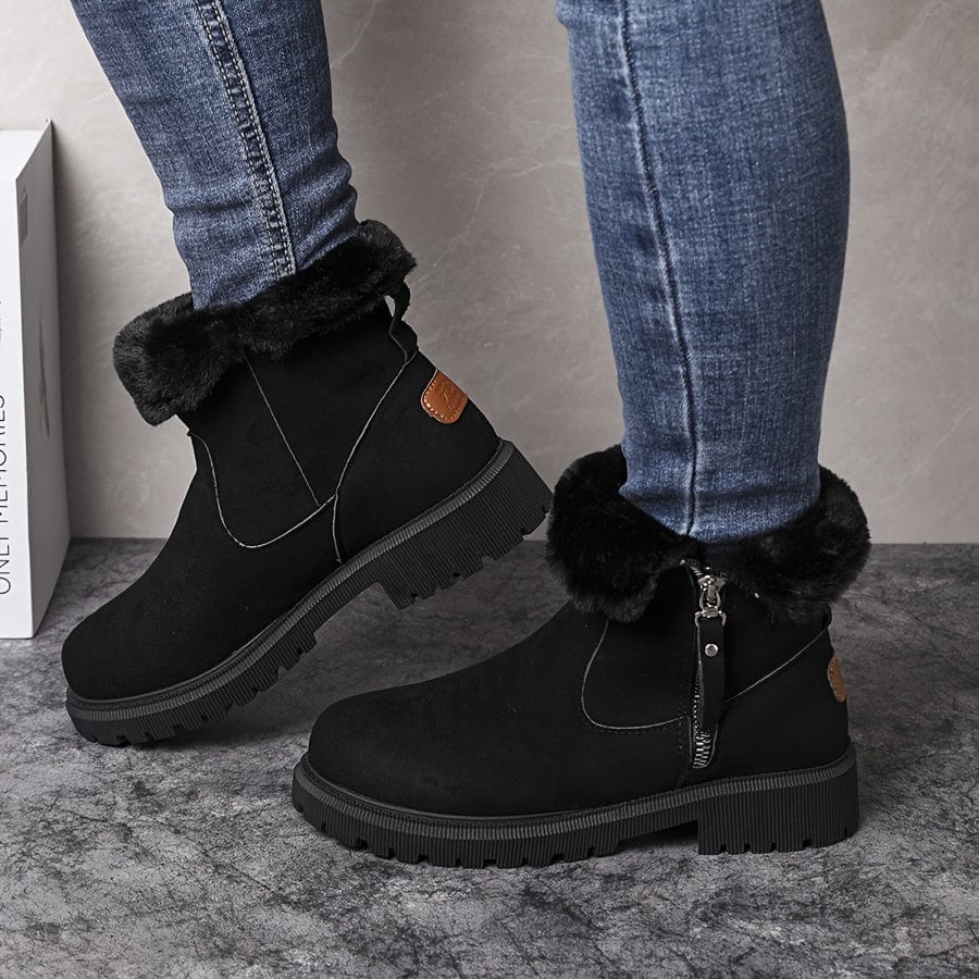 Wren fur lined ankle boots in black suede, front view on model